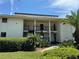 Condominium exterior featuring well maintained landscaping and multi-story balconies at 29129 Bay Hollow Dr # 3201, Wesley Chapel, FL 33543