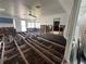 Open-concept living space showing subfloor, with natural light and ceiling fan at 3007 Clinton S St, Gulfport, FL 33707