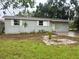 Charming single-story home with a traditional design and a spacious front yard at 310 2Nd Nw Ave, Ruskin, FL 33570