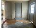Interior room with a variety of doorways and mixed flooring materials at 310 2Nd Nw Ave, Ruskin, FL 33570