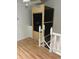 Residential elevator in a home, with wooden railing at 3145 Meta Ct, Largo, FL 33771