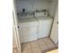 Bright laundry room with a washer and dryer set at 3145 Meta Ct, Largo, FL 33771