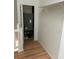Upstairs utility closet with hardwood floors at 3145 Meta Ct, Largo, FL 33771