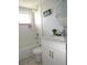 Bathroom featuring a shower and bath combination and a sink vanity with marble countertop at 3424 Truman Dr, Holiday, FL 34691