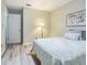Bedroom with modern floors and a cozy, comfortable bed at 35058 Whispering Oaks Blvd, Dade City, FL 33523
