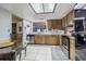 Spacious kitchen featuring stainless steel appliances and an open layout at 35058 Whispering Oaks Blvd, Dade City, FL 33523