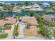Aerial shot highlighting the property's canal front location and convenient access to open water at 3560 Beach Se Dr, St Petersburg, FL 33705