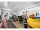 Two car garage with washer dryer and table at 3560 Beach Se Dr, St Petersburg, FL 33705