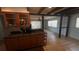 Well-lit kitchen featuring granite countertops, wooden cabinets, and tile flooring at 3560 Beach Se Dr, St Petersburg, FL 33705