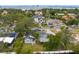 Aerial shot showcasing a well-maintained lawn surrounded by lush greenery at 493 Lucerne Ave, Tampa, FL 33606