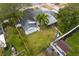 Aerial view of a well maintained backyard with a lush green lawn at 493 Lucerne Ave, Tampa, FL 33606