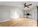 Bright, open bedroom with vaulted ceiling, hardwood floors, and built-in storage at 493 Lucerne Ave, Tampa, FL 33606