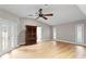 Spacious bedroom boasting natural light, hardwood floors, and ample closet space at 493 Lucerne Ave, Tampa, FL 33606