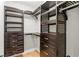 Well-organized walk-in closet with custom shelving and drawers for optimal storage at 493 Lucerne Ave, Tampa, FL 33606
