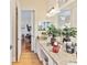 Bathroom featuring granite countertops and vanity with indoor plants on display at 5182 Championship Cup Ln, Spring Hill, FL 34609