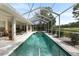 Enjoy the long, screen-enclosed pool and spa, along with the view of the adjacent golf course at 5182 Championship Cup Ln, Spring Hill, FL 34609