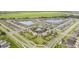 Primary-planned community featuring single-Gathering homes, ponds, manicured landscaping, and community pool at 5518 Blue Azure Dr, Wimauma, FL 33598