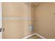 Walk-in closet with wood-look flooring and wire shelving at 568 Shoreham Ne Ct, St Petersburg, FL 33716