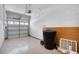 View of the garage, featuring a garage door and storage options at 568 Shoreham Ne Ct, St Petersburg, FL 33716