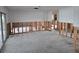 Open-concept interior with exposed framing, ready for customization and modern upgrades at 5688 Oakhurst Dr, Seminole, FL 33772