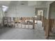 Spacious interior showcasing exposed framing and block construction, ready for renovation at 5688 Oakhurst Dr, Seminole, FL 33772