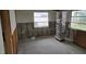 Interior showcasing exposed block walls and framing, providing a blank canvas for renovation at 5688 Oakhurst Dr, Seminole, FL 33772