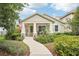 Charming one-story home boasts a cozy front porch, well-maintained landscaping, and a welcoming entrance at 6005 Shell Ridge Dr, Lithia, FL 33547