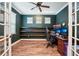 Office space with built in shelves and a French door at 6005 Shell Ridge Dr, Lithia, FL 33547