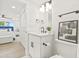 Stylish bathroom featuring modern fixtures, a vanity, and minimalist decor in a bright, clean space at 6404 Monterey Blvd, Tampa, FL 33625