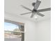 This bedroom boasts a modern ceiling fan, plenty of natural light, and a bright, airy atmosphere at 6404 Monterey Blvd, Tampa, FL 33625