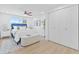 Cozy bedroom with a ceiling fan, large window, and a comfortable bed at 6404 Monterey Blvd, Tampa, FL 33625
