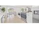 Stylish open kitchen with stainless steel appliances and modern countertops at 6404 Monterey Blvd, Tampa, FL 33625