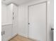 Bright laundry room features modern cabinetry and is conveniently located near the washing machine and dryer at 6404 Monterey Blvd, Tampa, FL 33625