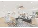 Bright living room seamlessly connects to the kitchen and dining area, perfect for entertaining at 6404 Monterey Blvd, Tampa, FL 33625