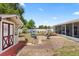 A spacious backyard with a shed, a blue swing, seating, and a screen enclosed patio at 6698 35Th N Ave, St Petersburg, FL 33710