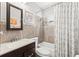 Updated bathroom featuring a shower-tub combination, decorative tile and a modern vanity at 6698 35Th N Ave, St Petersburg, FL 33710