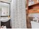 Bathroom with a tub-shower combo, decorative shower curtain and vanity at 6698 35Th N Ave, St Petersburg, FL 33710