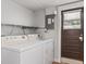 Laundry room featuring a washer, dryer and built in shelving at 6698 35Th N Ave, St Petersburg, FL 33710