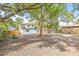 Large backyard with an abundance of shade offering plenty of room for outdoor activities and entertaining at 7 Hamilton Heath Dr, Tampa, FL 33604