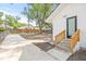 Spacious backyard featuring a concrete patio, an outdoor space, and a newly renovated exterior entrance at 7 Hamilton Heath Dr, Tampa, FL 33604