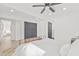 Bedroom features include ceiling fan, hardwood floors, closet and bathroom access at 7 Hamilton Heath Dr, Tampa, FL 33604
