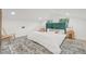 Sunlit bedroom showcasing modern decor and large windows at 7 Hamilton Heath Dr, Tampa, FL 33604