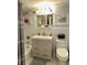 Bathroom with vanity, drawers, and updated sink at 7200 Sunshine Skyway S Ln # 2E, St Petersburg, FL 33711