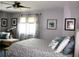 Spacious bedroom boasts a ceiling fan and natural light at 7200 Sunshine Skyway S Ln # 2E, St Petersburg, FL 33711