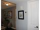 View of the hallway with decorations and a door at 7200 Sunshine Skyway S Ln # 2E, St Petersburg, FL 33711