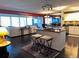 Open concept kitchen with a breakfast bar that opens to the living room at 7200 Sunshine Skyway S Ln # 2E, St Petersburg, FL 33711