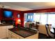 Open-concept living room and kitchen area with bright, natural light and modern décor at 7200 Sunshine Skyway S Ln # 2E, St Petersburg, FL 33711