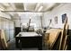 Condo storage room with an assortment of items in a warehouse-like setting at 7200 Sunshine Skyway S Ln # 2E, St Petersburg, FL 33711