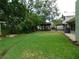 A large, green backyard, perfect for recreation and outdoor activities at 888 Forest Glen Rd, Clearwater, FL 33765