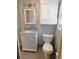A traditional bathroom with vanity and cabinets for storage at 888 Forest Glen Rd, Clearwater, FL 33765
